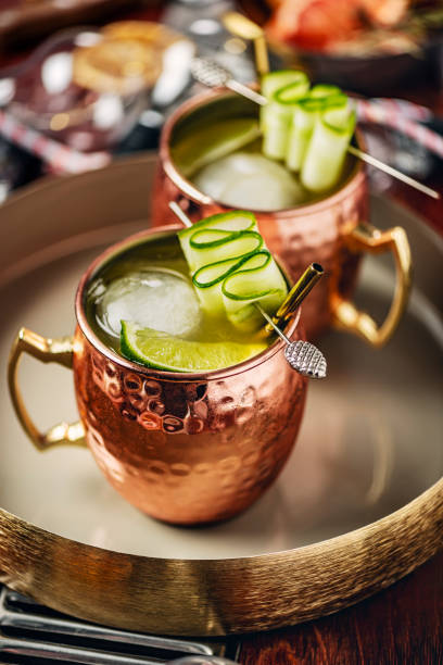 moscow mule mango mocktail - ginger drink alcohol drinking straw foto e immagini stock