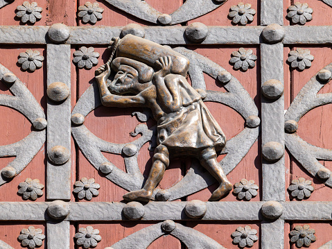 The porters of stones (locally known as 'bastaixos') who helped in construction on the doors of Santa Maria del Mar church, Barcelona