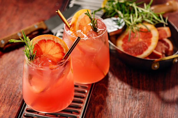 Paloma Cocktail Paloma’s are primarily made with red grapefruit, lime juice and agave syrup to add some sweetness, and top up the glass with club soda, serve over crushed ice, with a sprig of fresh rosemary. Delicious, refreshing and alcohol free, perfect for dry January. If you can’t get agave syrup use a simple sugar syrup instead. cocktail stock pictures, royalty-free photos & images