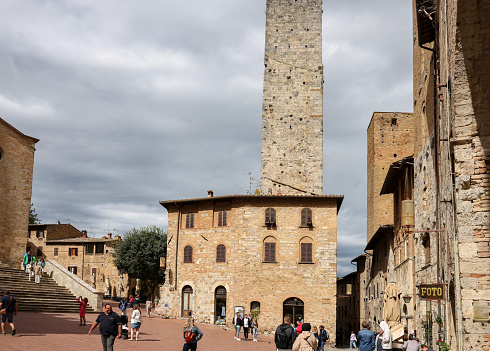 San Gimignano, Italy - Sept 17, 2022: Piazza Duomo in San Gimignano. Tuscany, Italy