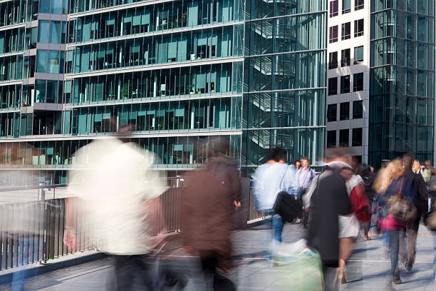 istock Motion Blur of Business People Walking 182434454