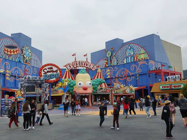 Los Angeles, United States – May 06, 2019: A lively crowd of people strolling in Krustyland. Universal Studios, Los Angeles