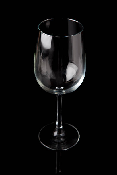 istock Clean wine glass on black background 182434731