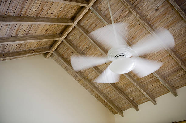 Fan "Ceiling fan, movement in blades" ceiling fan stock pictures, royalty-free photos & images