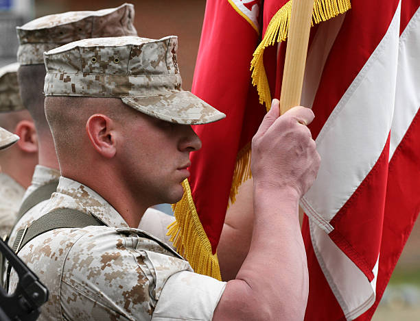 Marine Color Guard Marine carrying Marine Corps flag. us marine corps stock pictures, royalty-free photos & images