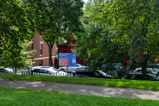 A sign on Bunker Hill giving information relating to the Freedom Trail and American Revolution. Boston, Massachusetts, USA