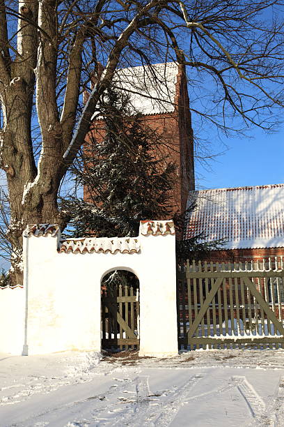 istock Gate to medieval church in winter and snow 182437837