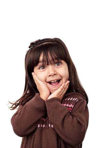 little latina girl in happy shock state stock photo