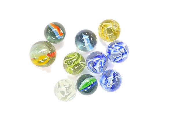 istock Ten glass marbles isolated on a white background 182438071
