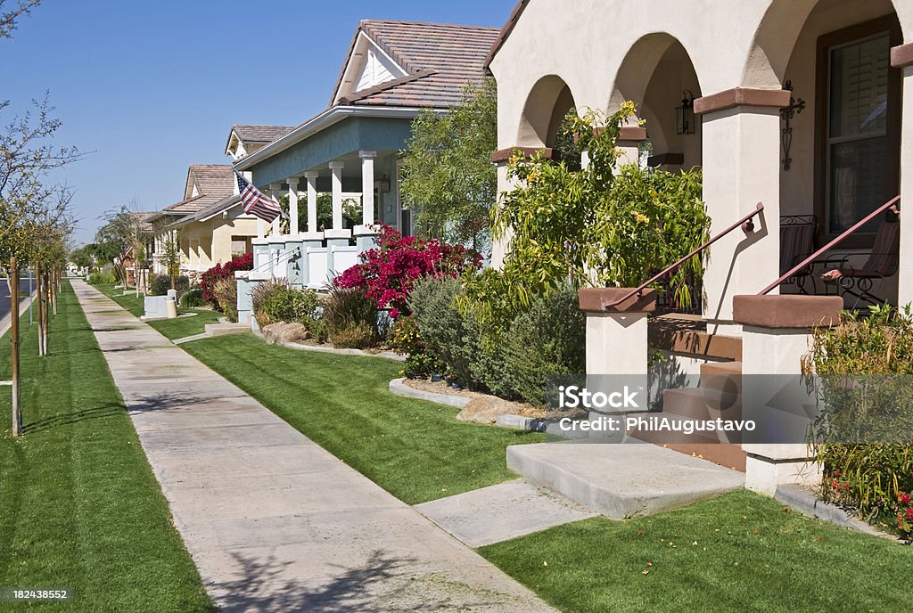 Lawn mowing day in planned community Lawn mowing day in planned community in Arizona Community Stock Photo