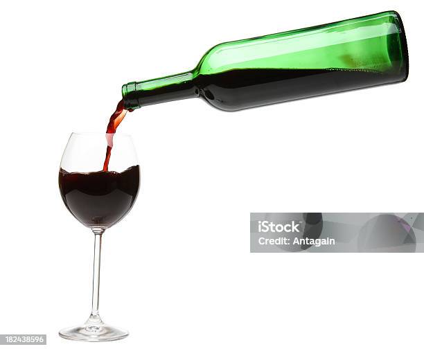 Red Wine Pouring Into A Wineglass Stock Photo - Download Image Now - Drinking Glass, Glass - Material, Pouring