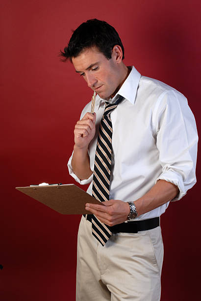 istock Business Man with Clipboard 182438959