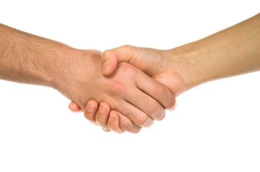 Man and woman handshaking isolated on white background
