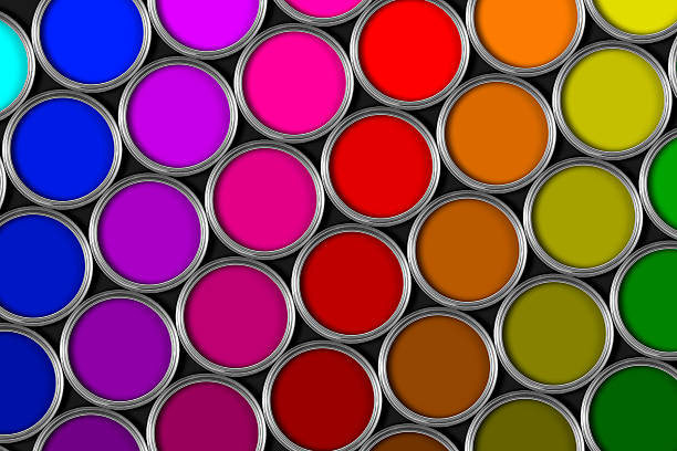 istock Multi colored tins of paint on black bacground 182440403