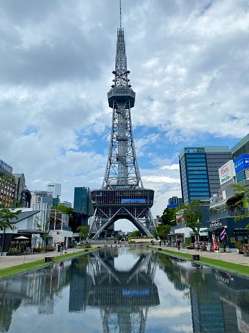 Sapporo, Japan - August 21, 2019 : Odori Park in Sapporo, Hokkaido, Japan. Throughout the year, many events are held in the Odori Park. The Sapporo TV Tower have an observation deck, souvenir shop and restaurant. It is a famous tourist attraction in Sapporo.