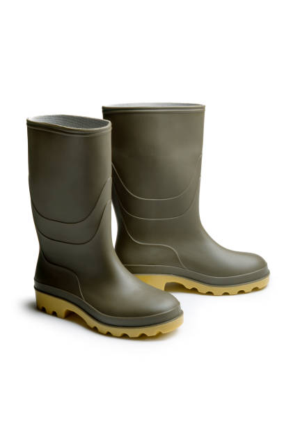 Shoes: Green Rubber Boots More Photos like this here... rubber boot stock pictures, royalty-free photos & images