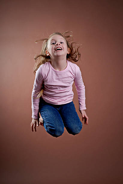 istock Little Girl Jumping Series 182440788