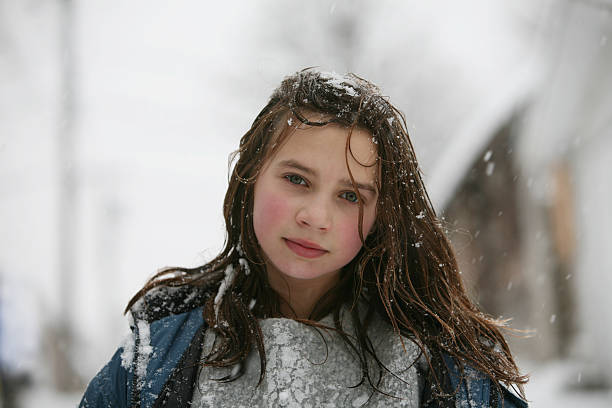 A family day of sliding in the mountains in winter, Quebec, Canada