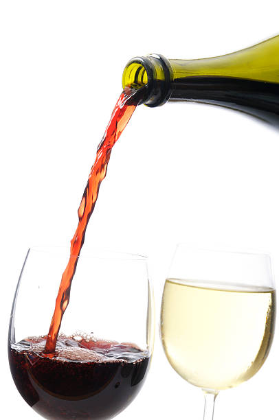 istock Red Wine being Poured into a Glass 182441476