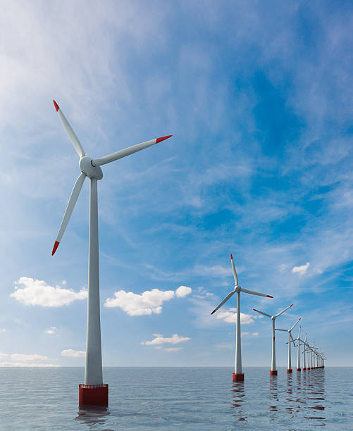 Offshore wind farm Offshore energy production at a wind power plant. 3d render.Similar images: offshore wind farm stock pictures, royalty-free photos & images