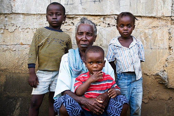 An African grandmother with her grandchildren.