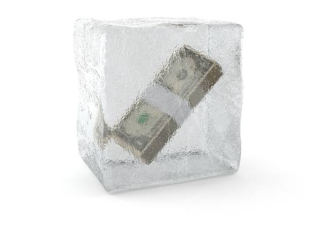 冷凍ドル - frozen currency finance ice ストックフォトと画像