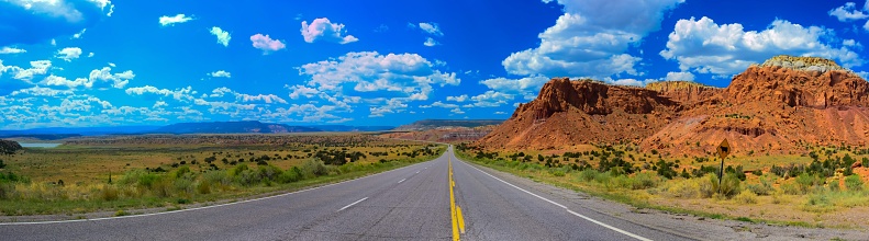A scenic view of US 84 in New Mexico stretching between Abiquiu and the famous Ghost Ranch