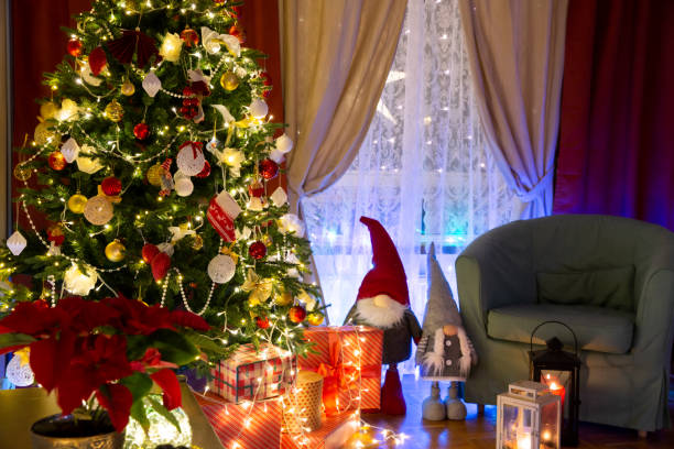 istock Christmas tree decorations in the living room at night 1824432029