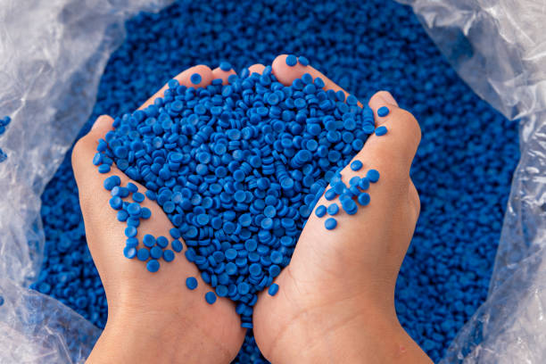 istock White plastic grain, plastic polymer granules,hand hold Polymer pellets, Raw materials for making water pipes, Plastics from petrochemicals and compound extrusion, resin from plant polyethylene. 1824444317