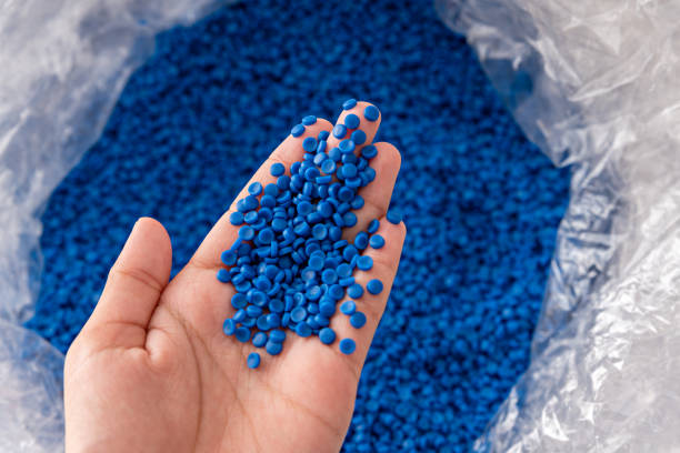 istock White plastic grain, plastic polymer granules,hand hold Polymer pellets, Raw materials for making water pipes, Plastics from petrochemicals and compound extrusion, resin from plant polyethylene. 1824444328