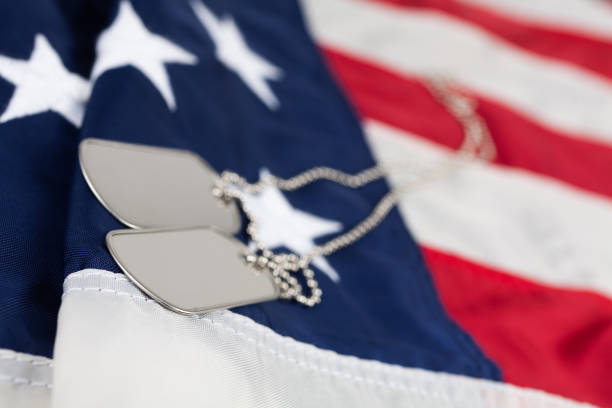 istock US army dog tags on USA national flag 1824448258