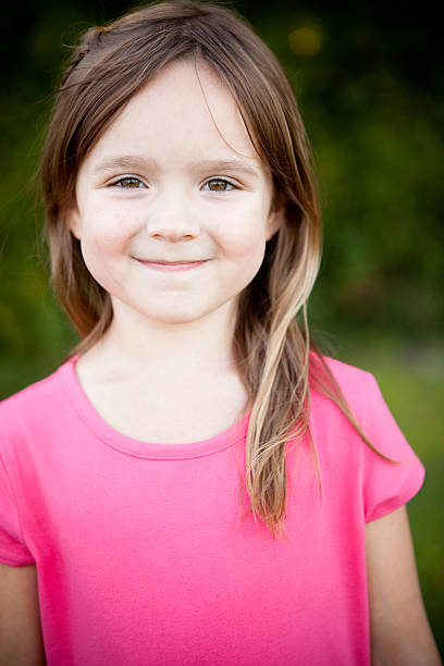 istock Happy Young Girl Smiling Outside 182445883