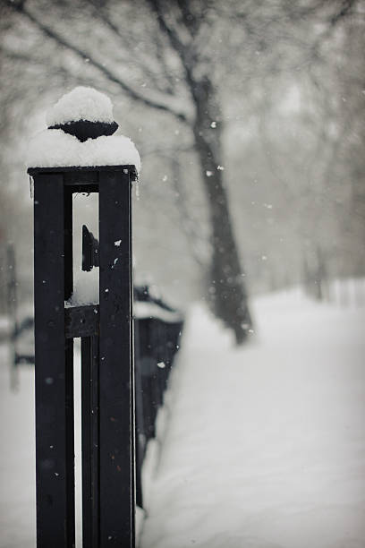 istock Park fence in a snowy day 182446091