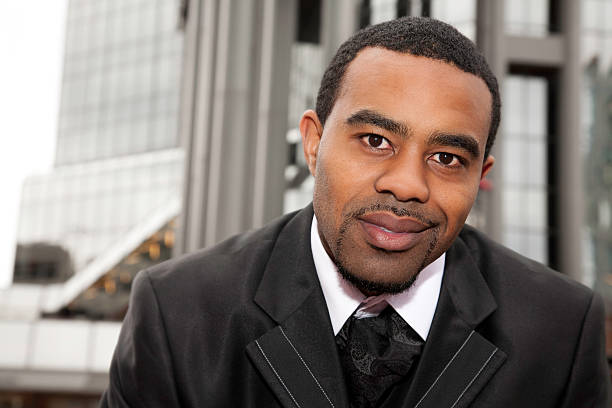 istock Confident Businessman Outside Office Building with Copy Space 182446508