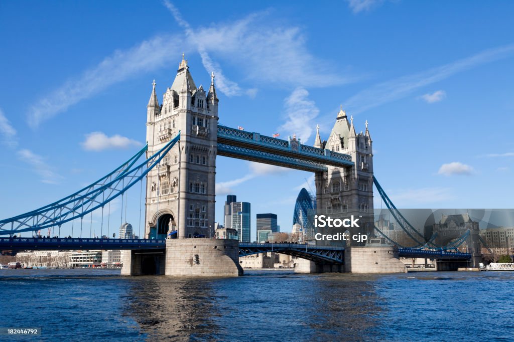 Tower Bridge over River Thames, London UK XXXL "Tower Bridge spanning the River Thames in London, UK, with the City skyscrapers including the Gherkin seen beyond." Blue Stock Photo