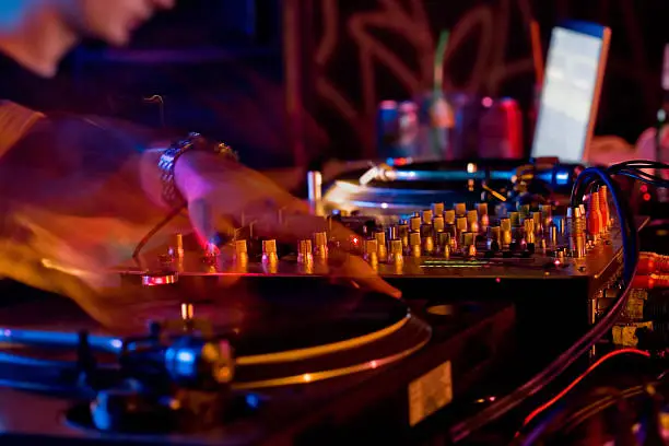 a close-up of dj hands at workplease see other related images: