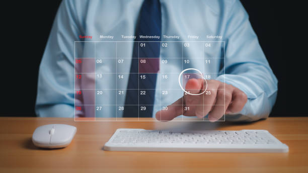 istock Businessman marking dates on virtual calendar, managing his business schedule, setting reminders for important appointments, creative collage for planning ideas, appointment scheduler 1824475223