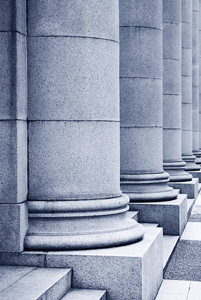 istock Close-up of a row of stone circular columns 182447762