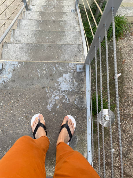 istock Human legs on stairs 1824532735
