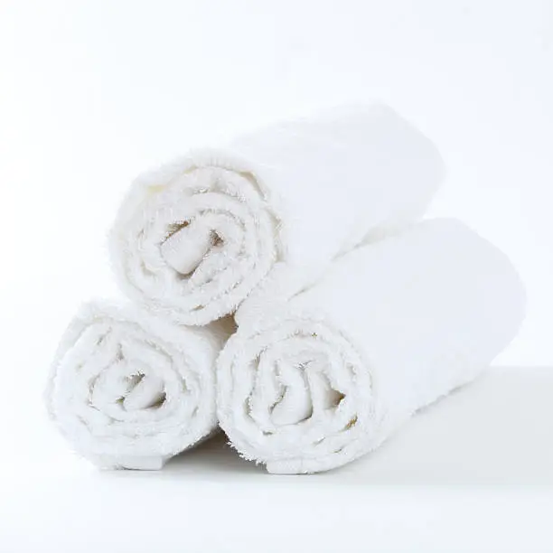 Three clean white towels