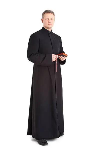 young priest isolated on white