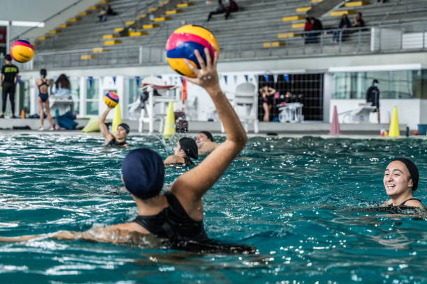 Tennis ball floats in outdoor swimming pool