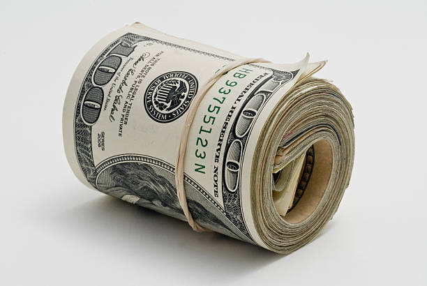 rolo de dinheiro. - money roll imagens e fotografias de stock