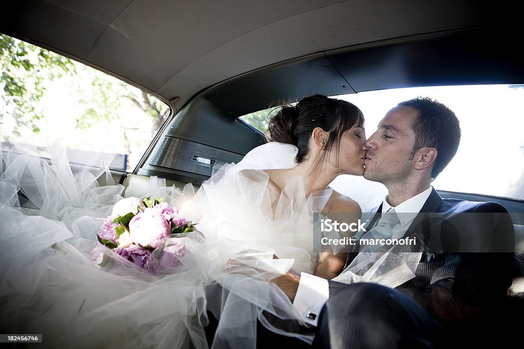 wedding into the car 30-34 Years Stock Photo