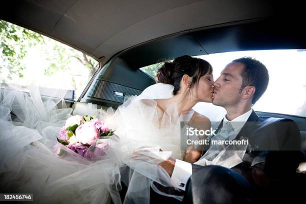 Wedding Into The Car Stock Photo - Download Image Now - 30-34 Years, Adult, Adults Only