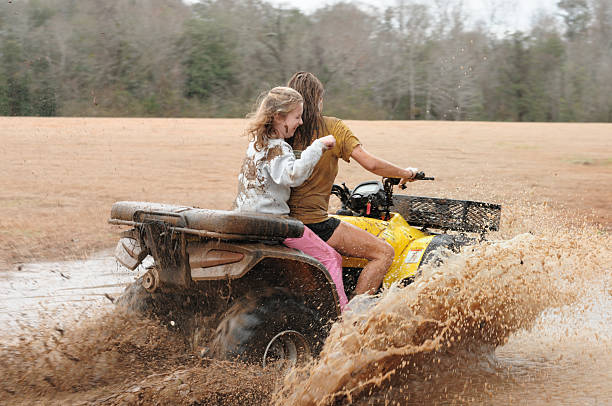 istock Girls riding four wheeler 182456936