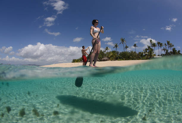 new sports trend  stand-up Paddle boarding