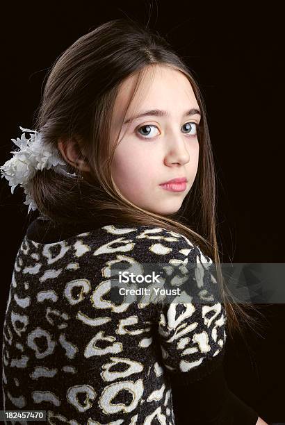 Girl Child Looking Backwards Stock Photo - Download Image Now - 10-11 Years, Back to Front, Beautiful People