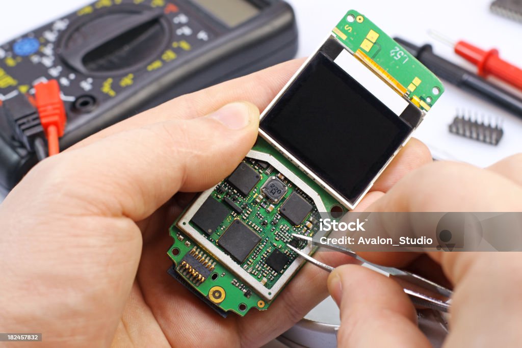 Electronic technician GSM Blue-collar Worker Stock Photo