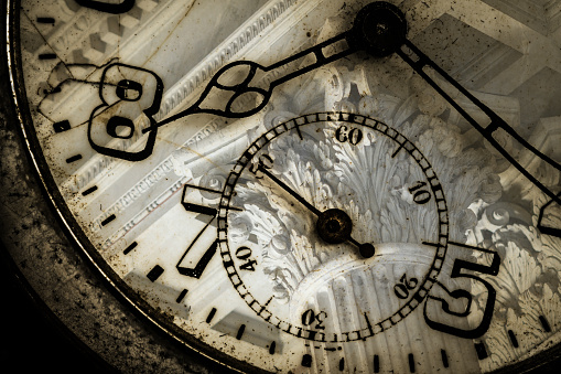 Double exposure of antique pocket watch and architecture, time concept